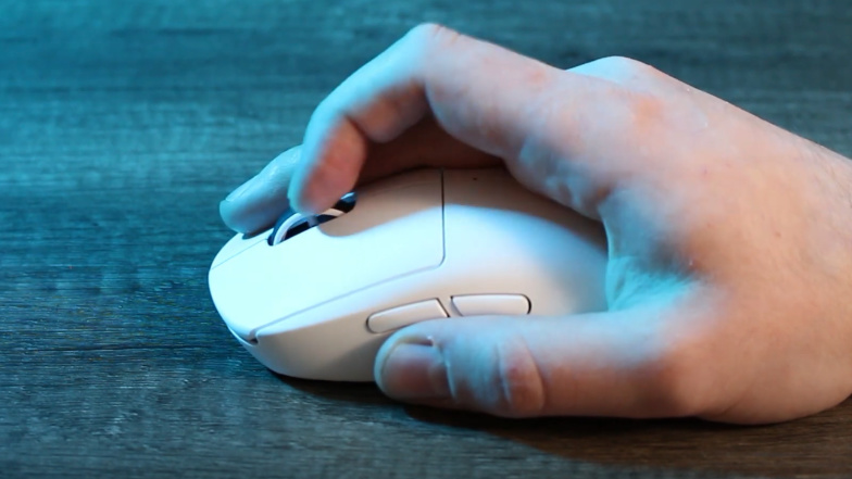 The Logitech G Pro X Superlight in hand, a screenshot from video testing by DiamondLobby